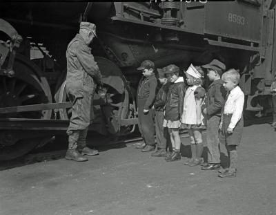 Hall Street School, children with train crew at Union Station