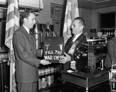 Banquet Barbecue, Tony Zoavas Presenting Day's Receipts to War Chest