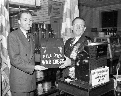 Banquet Barbecue, Tony Zoavas Presenting Day's Receipts to War Chest