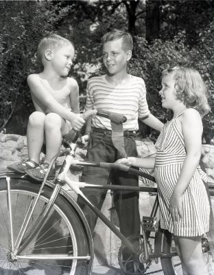 Children with bicycle