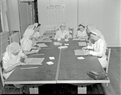 Red Cross, making bandages at headquarters